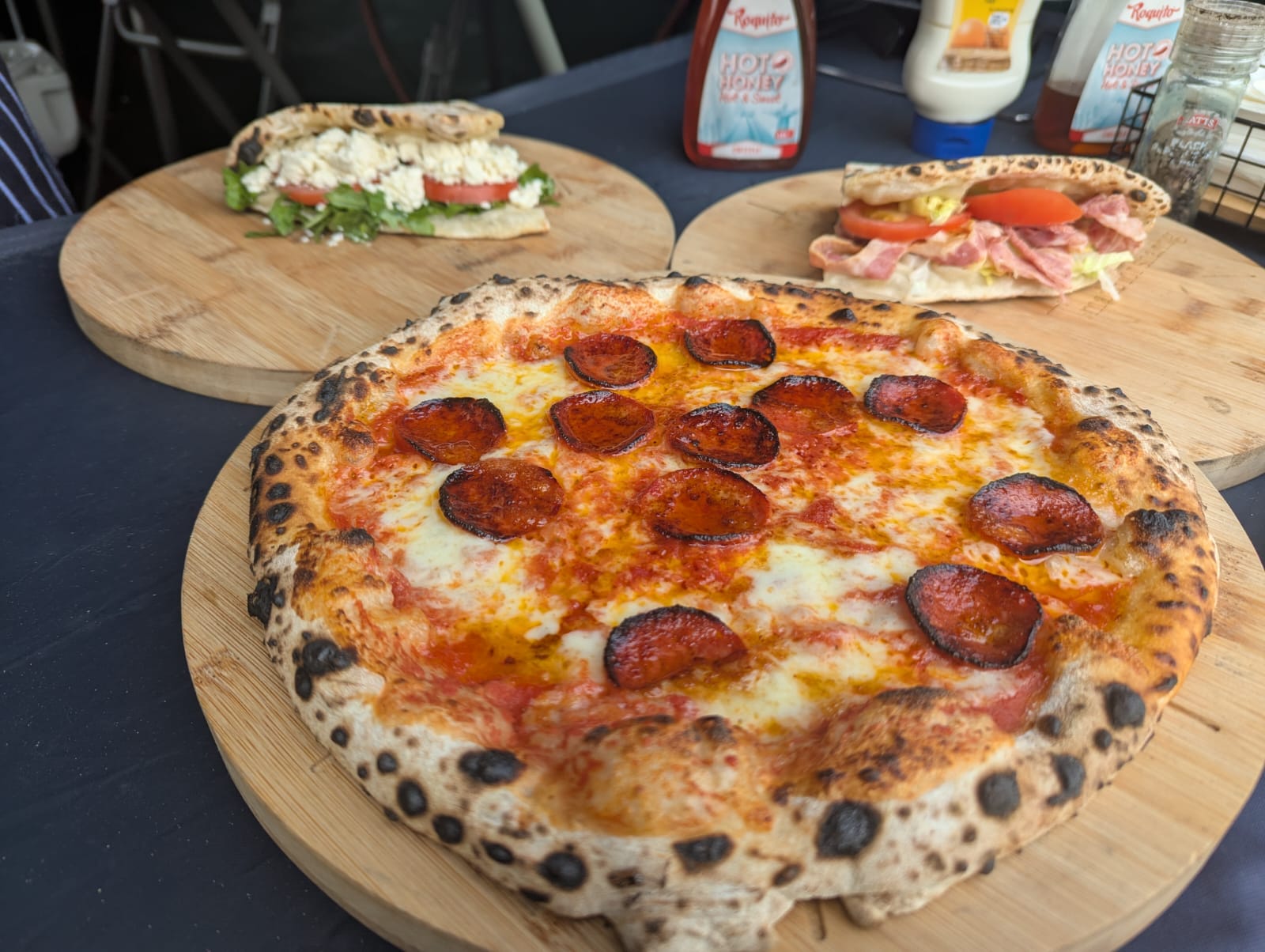 Mobile pizza kitchen setup at an outdoor event